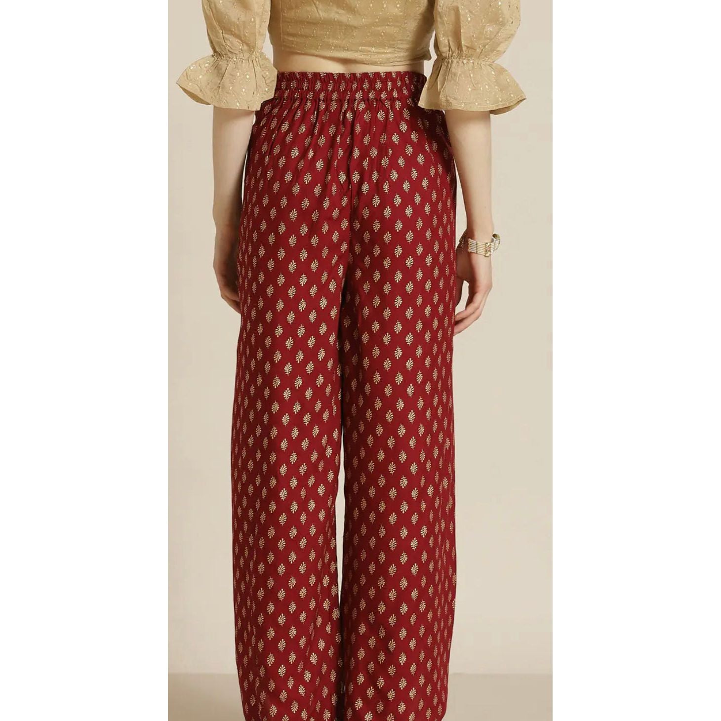 Dhoti pants for women, indo western wear, indo fusion wear. Maroon and gold prints dhoti pants with elastic waistband.