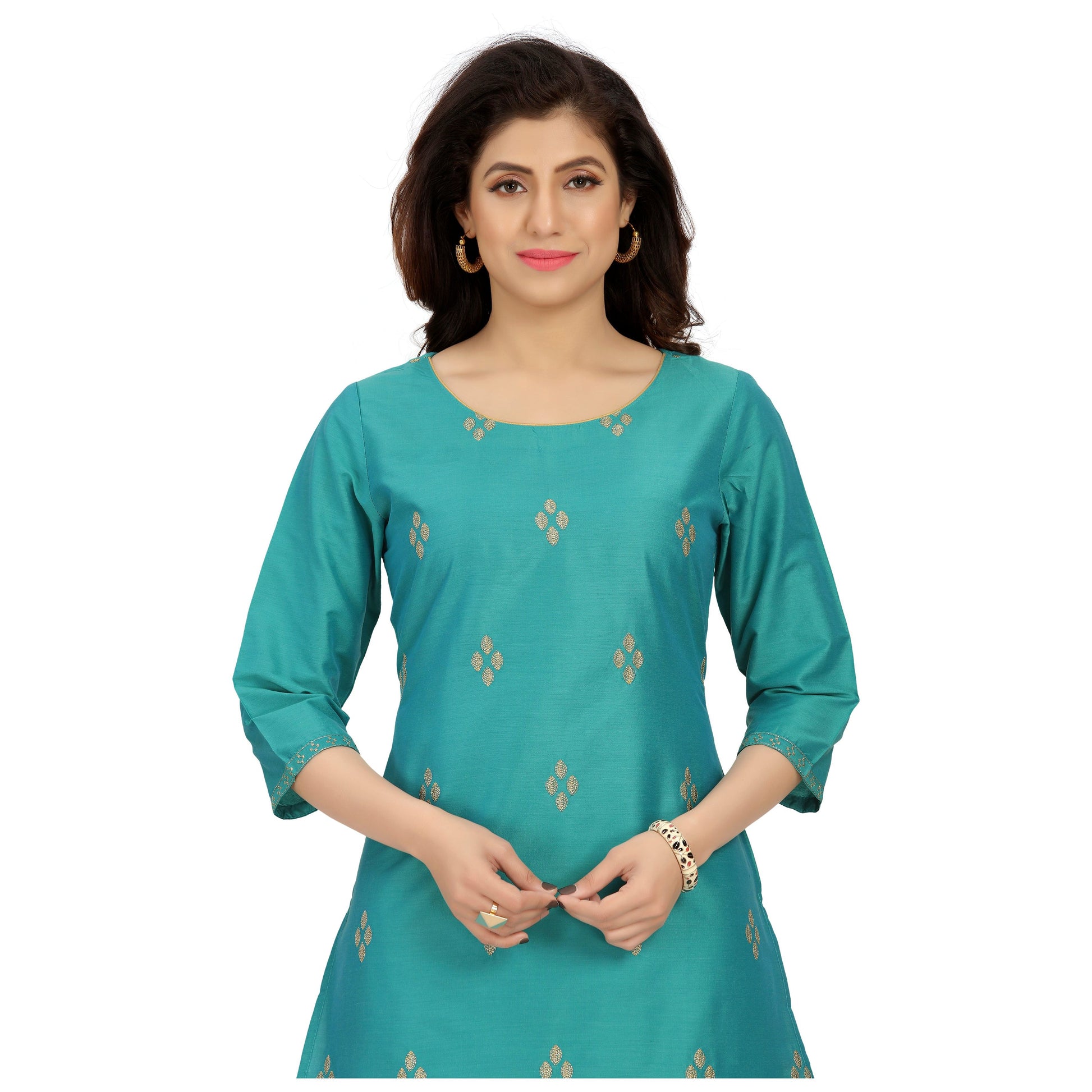 Simple, easy and elegant green kurta with small gold prints all over. Cotton silk material with 3/4th sleeves, the kurti is ideal for family lunch, festive wear or party wear. 