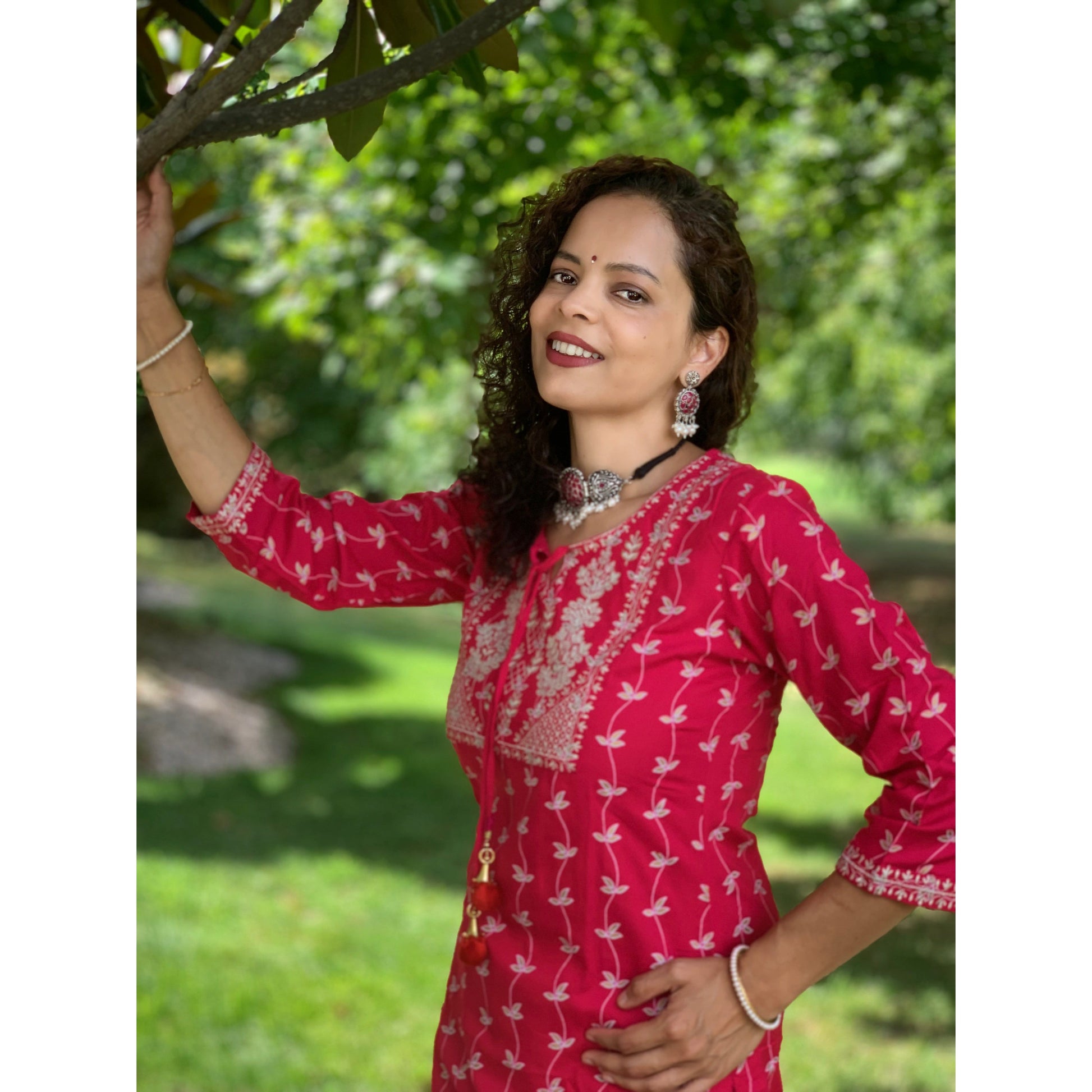 Pink printed kurta with pants. The neckline has dori strings with unique detailing on the neckline.  Ideal festive wear, diwali indian outfit idea. 